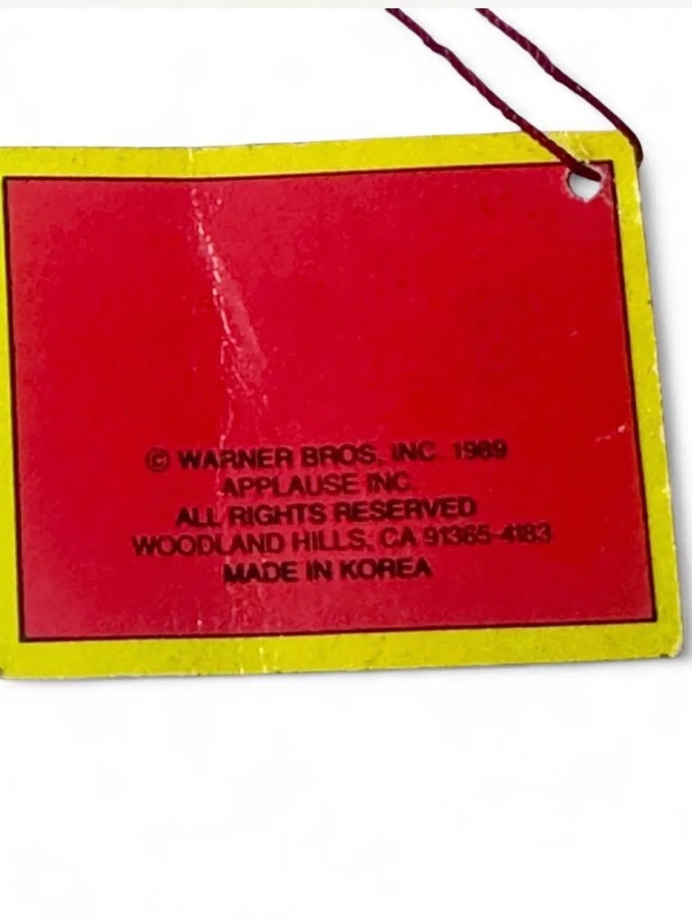 Warner Bros. Looney Tunes Red and Yellow Hang Tag